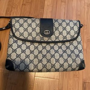 VINTAGE GUCCI BODY BAG in original GG print in blue.